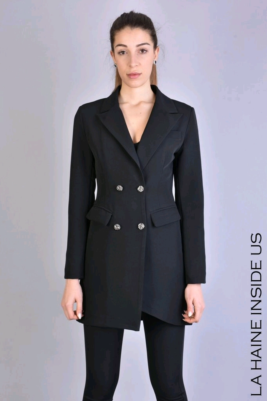 Giacca lunga asimmetrica in tecno stretch