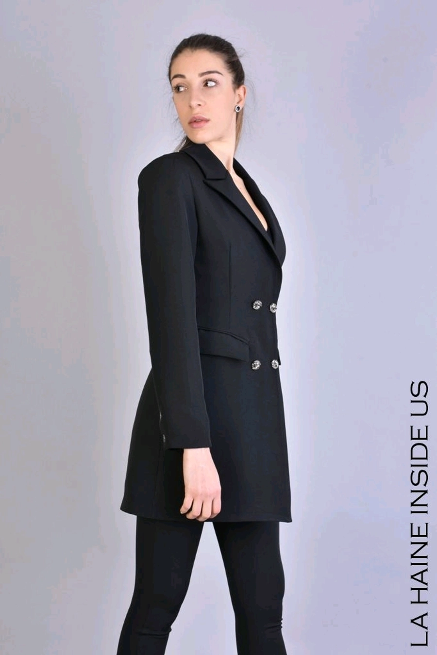 Giacca lunga asimmetrica in tecno stretch